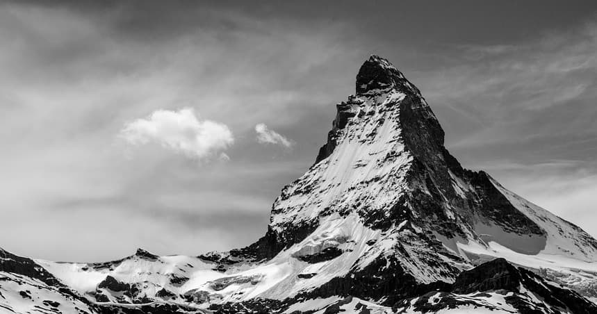 Snow-capped alpine peak in Swiss Alps, dramatic summit views