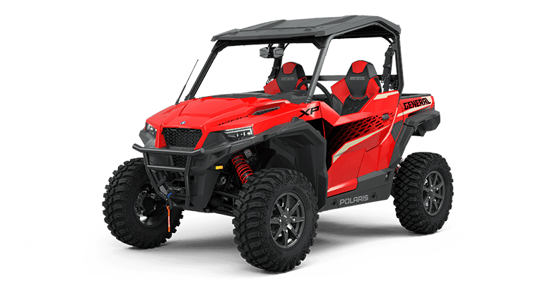 Red off-road UTV side-by-side on white studio backdrop showcasing rugged ride