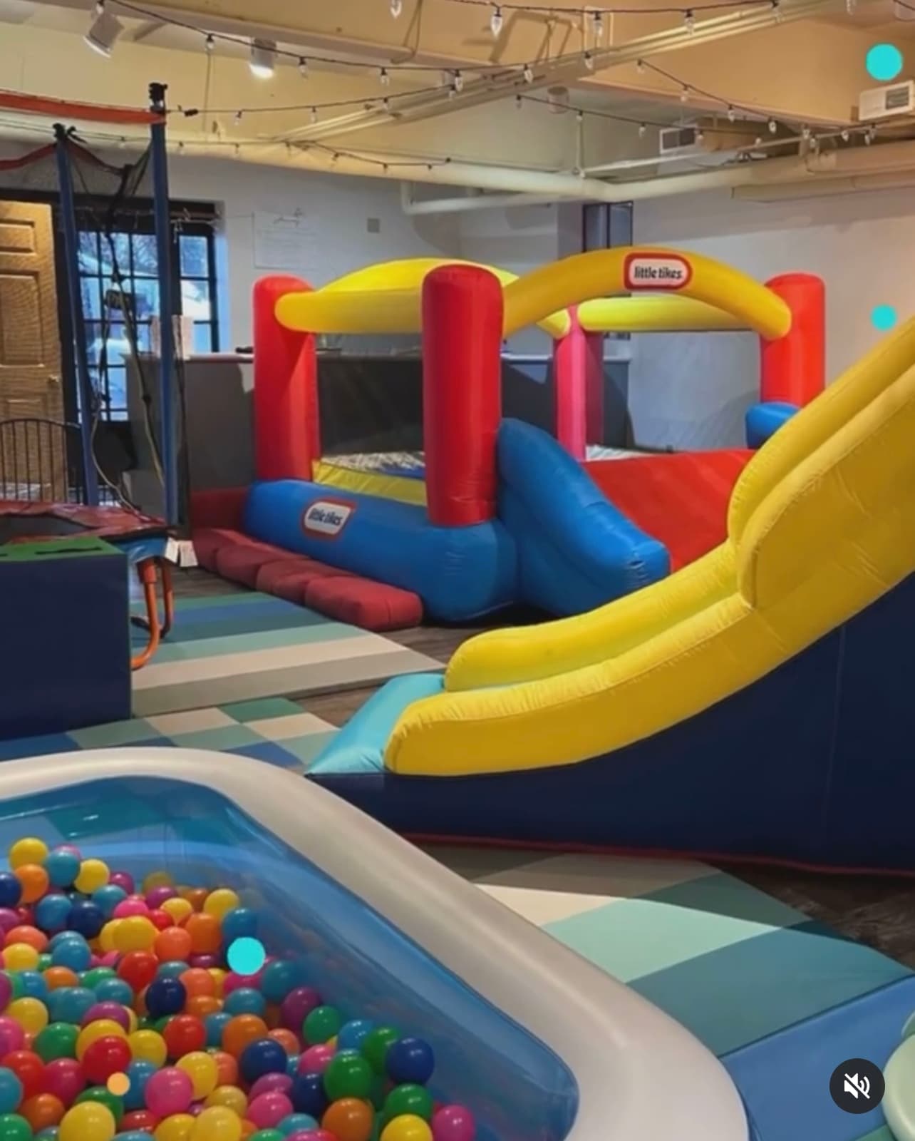 Indoor inflatable play center with ball pit and slides for kids