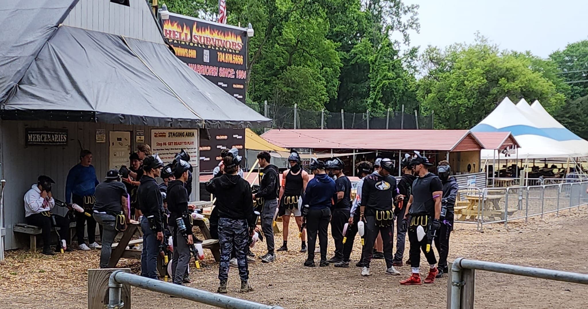 Paintball players gathered at Hell Survivors outdoor staging area
