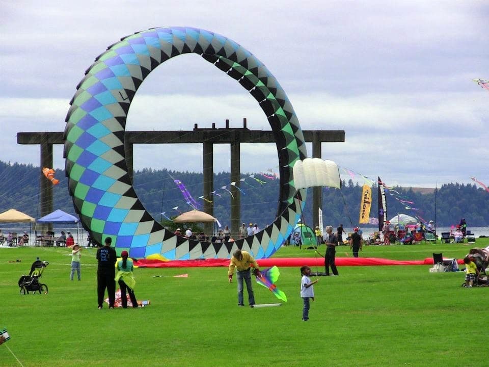 Large colorful kite ring at seaside park kite festival outdoors
