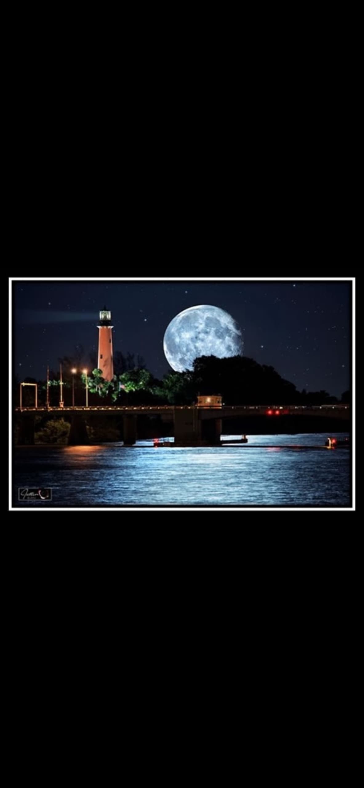 Moonlit harbor at night with reflections, nighttime coastal cruise