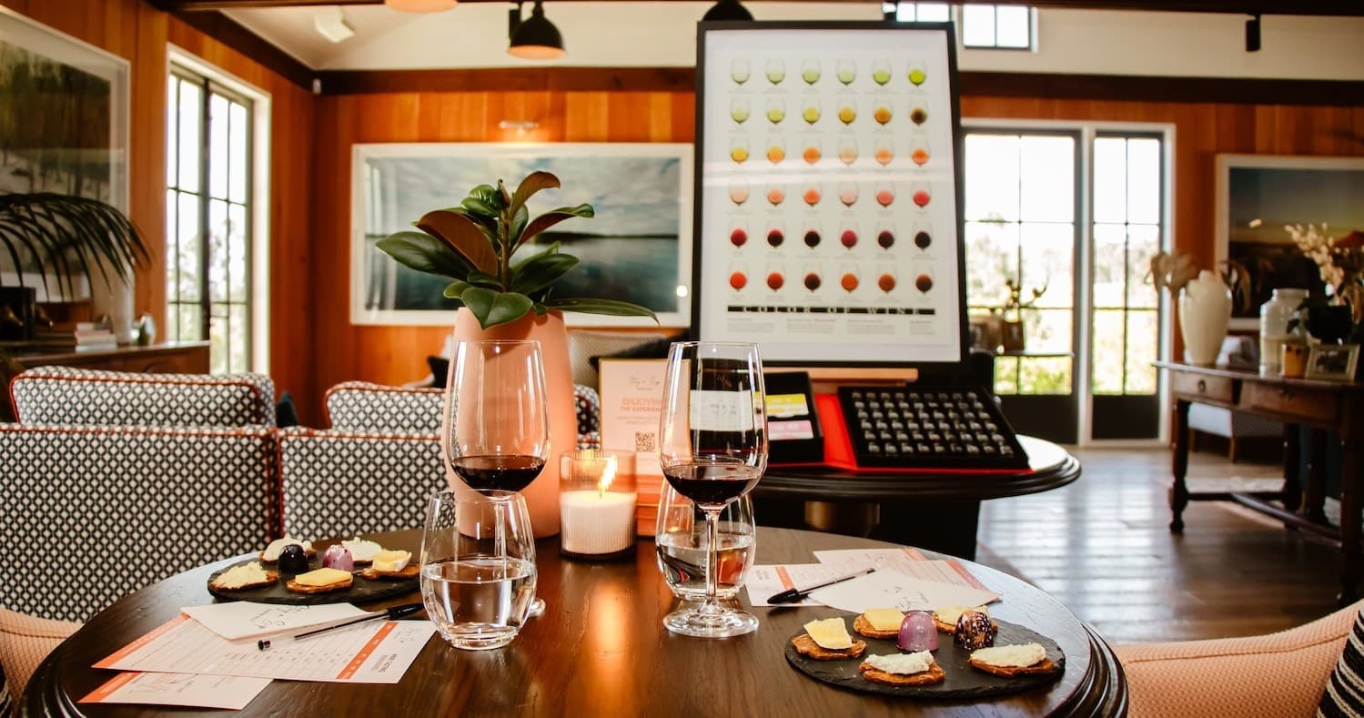 Wine tasting and cheese board in cozy winery lounge