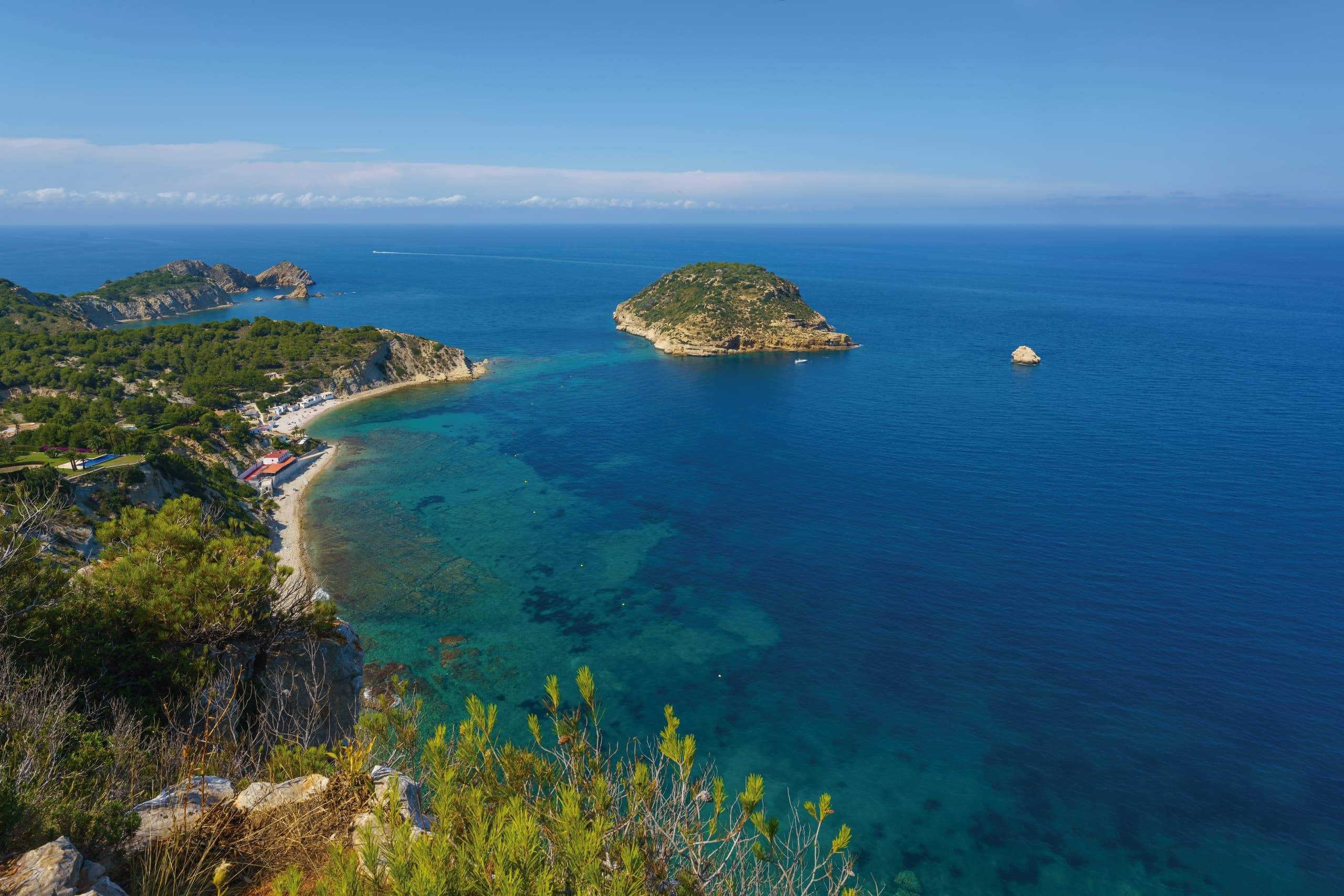 Scenic Mediterranean bay and small island off Denia Javea coast