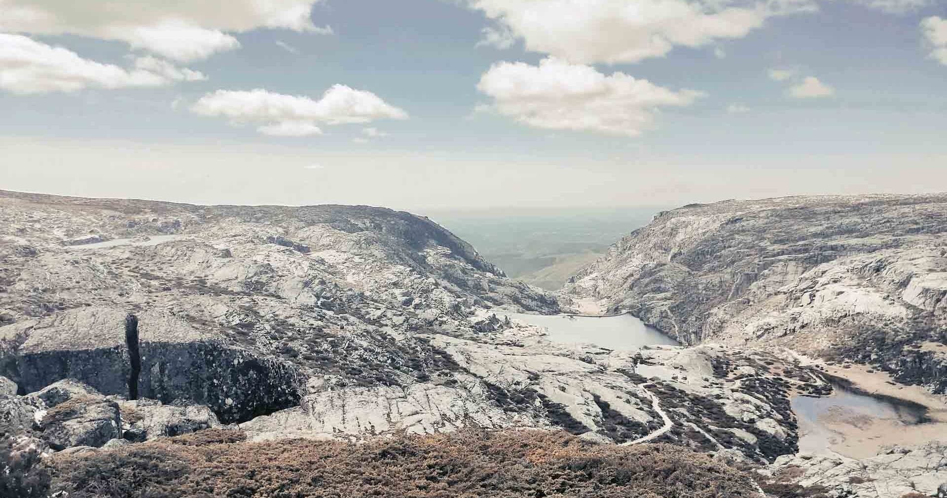 Panoramic canyon and river valley in rugged mountain landscape