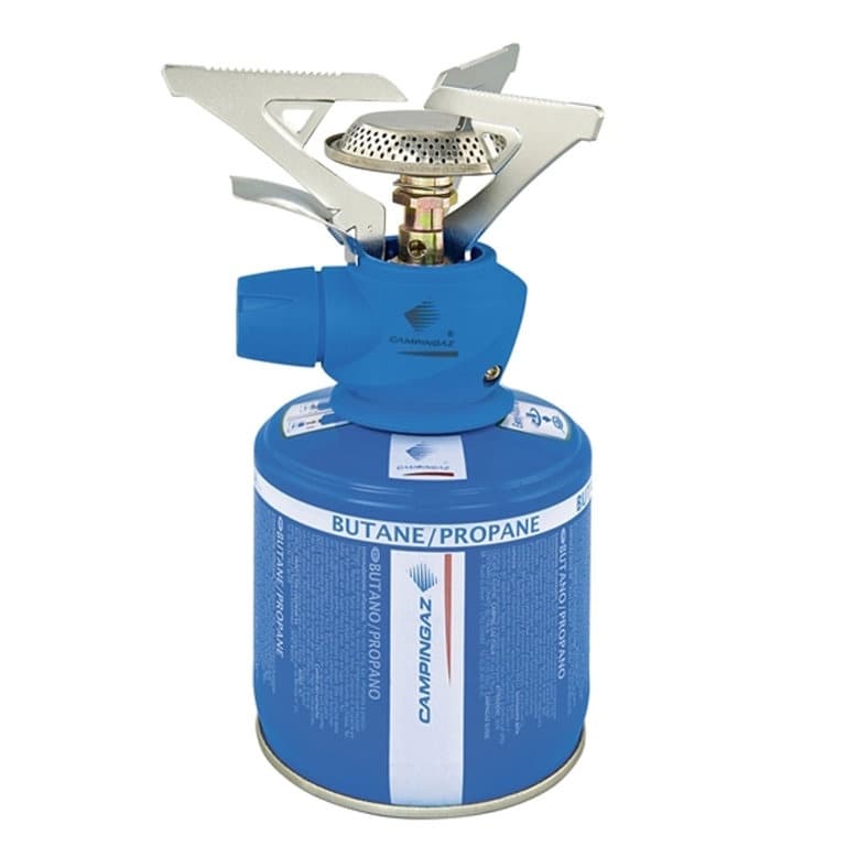 Portable butane camping stove for cooking meals at a campsite
