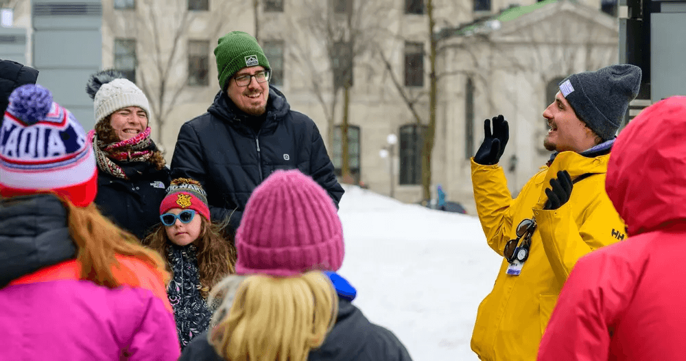 Family-friendly winter walking tour in snowy Quebec City plaza