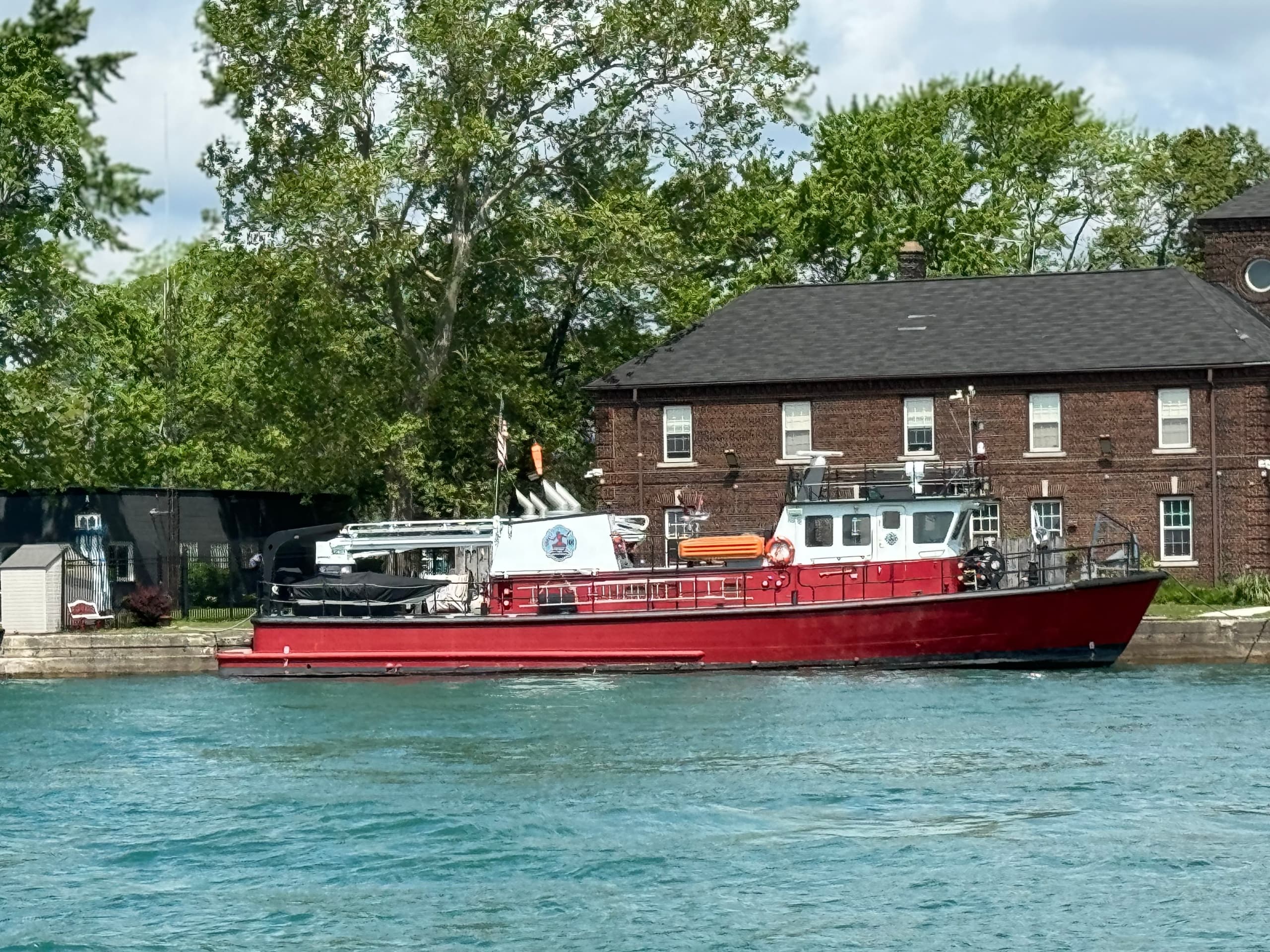 Explore Detroit's Floating Postal Code on a Scenic Boat Tour