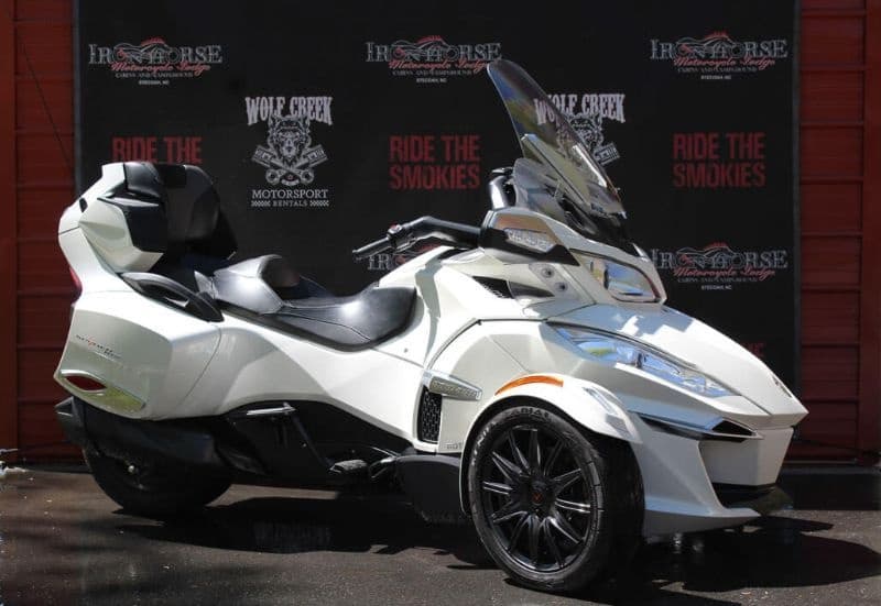 White three-wheeled trike displayed at rental showroom near Smokies