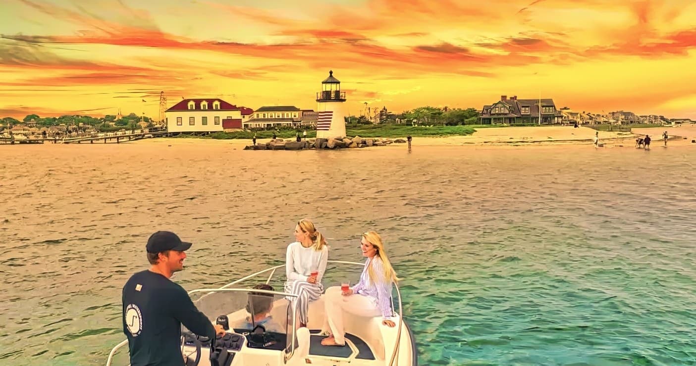 Sunset boat ride near shoreline with passengers enjoying coastal view