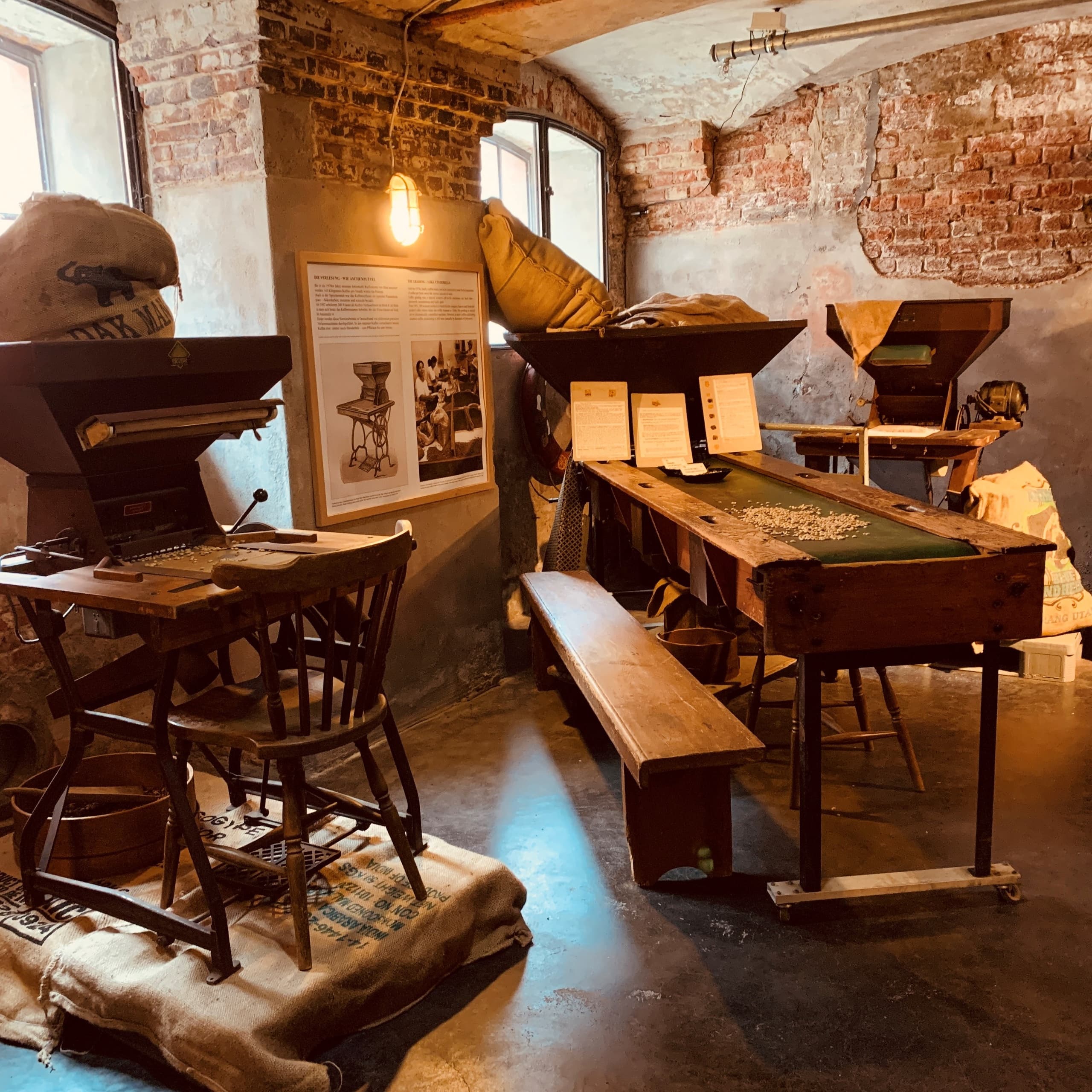Historic Kaffeemuseum Burg interior showing vintage coffee equipment and benches