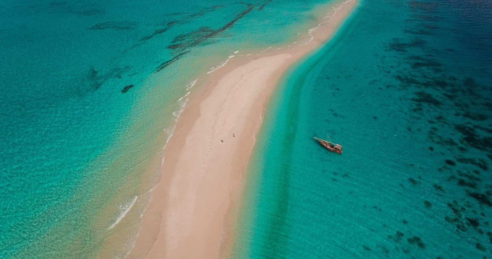 Aerial beach sandbar in turquoise waters, island day trip
