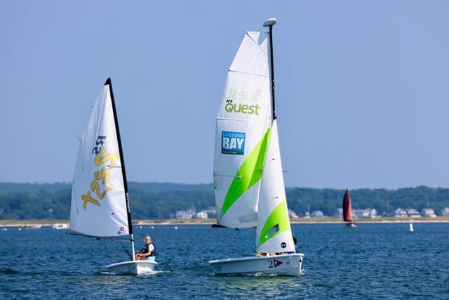 Small sailboats cruising on Buzzards Bay coastal waters