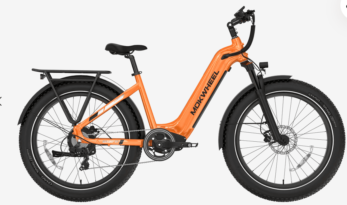 Orange electric city bike on studio backdrop for urban rides