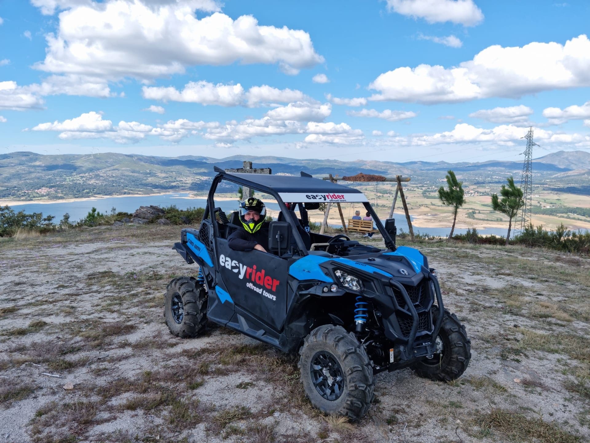 Off-road UTV ride across rocky plateau and open landscape