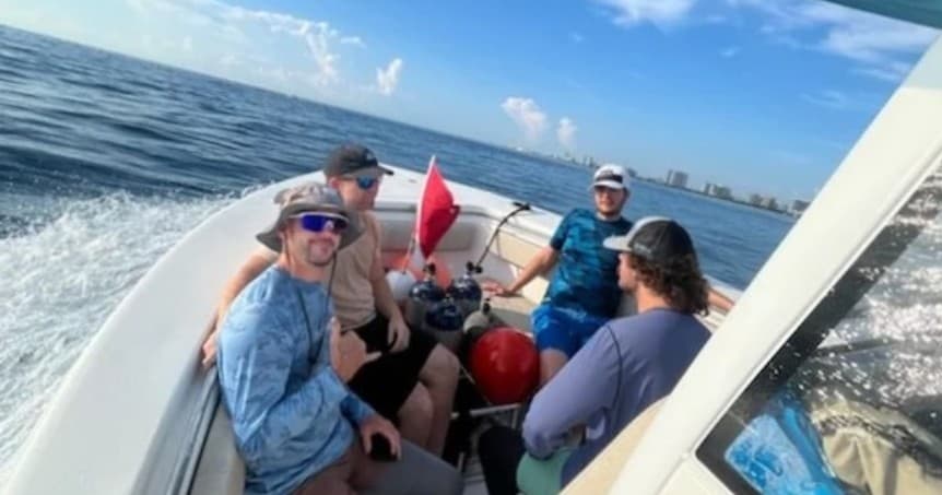 Passengers on speedboat offshore enjoying coastal ride in Florida