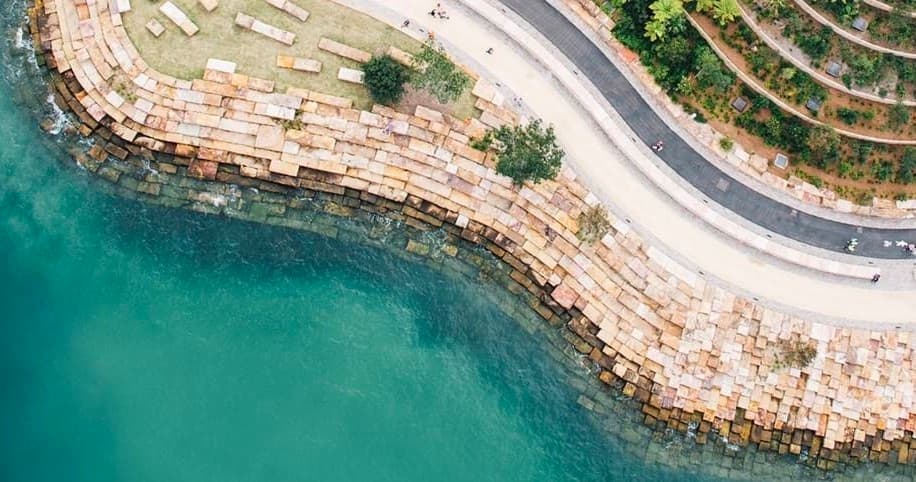 Curved shoreline and coastal seawall at Barangaroo waterfront
