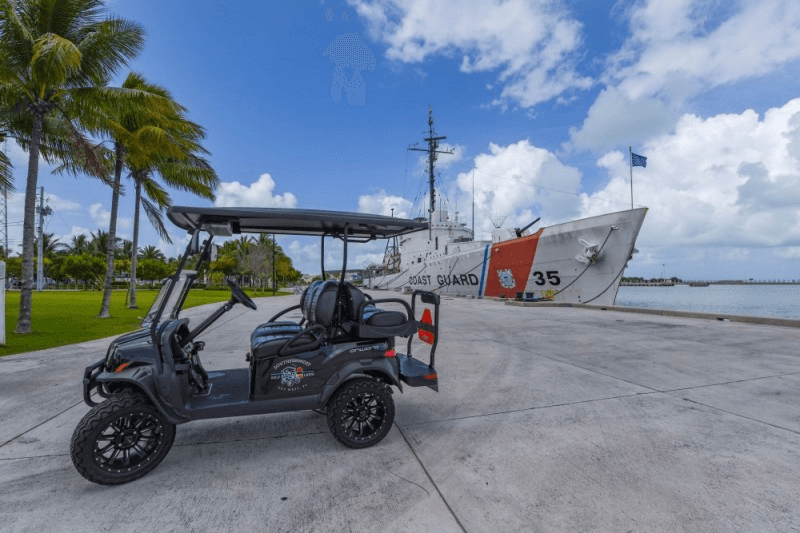 Golf cart near marina and boat ramp in Key West harbor