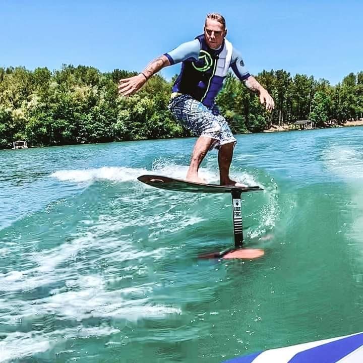 Ride the Waves: Discover Wakefoiling with Découverte Small Boat in Virelade