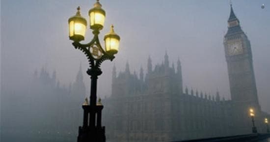 Foggy Westminster scene with lamppost and Big Ben skyline