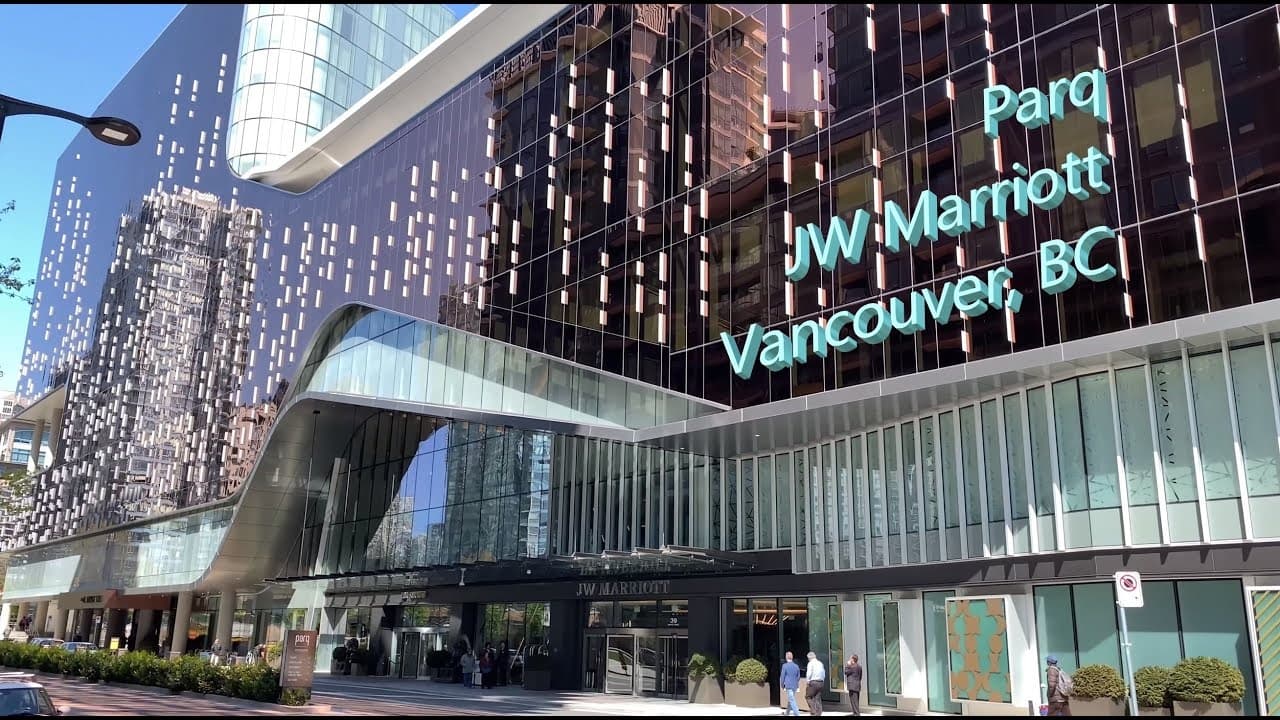 JW Marriott Parq Vancouver hotel glass facade, downtown urban scene
