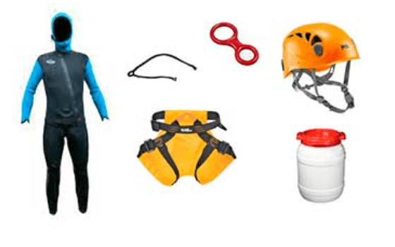 Wetsuit, harness and canyoning equipment laid out for descent