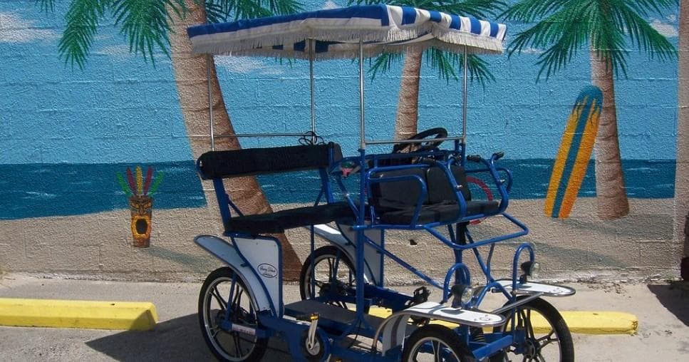 Family Surrey Bike Rentals on Galveston Seawall Ride