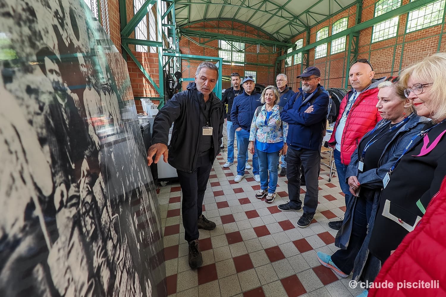 Guided heritage train museum tour inside restored industrial station