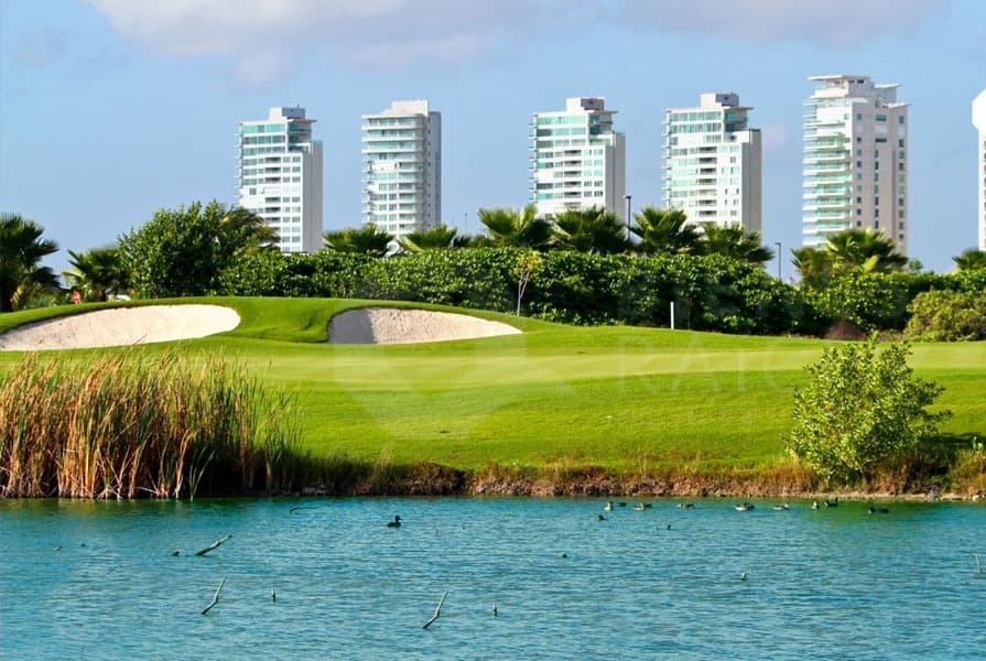 Golf & Sunset Views at Puerto Cancun Golf Course
