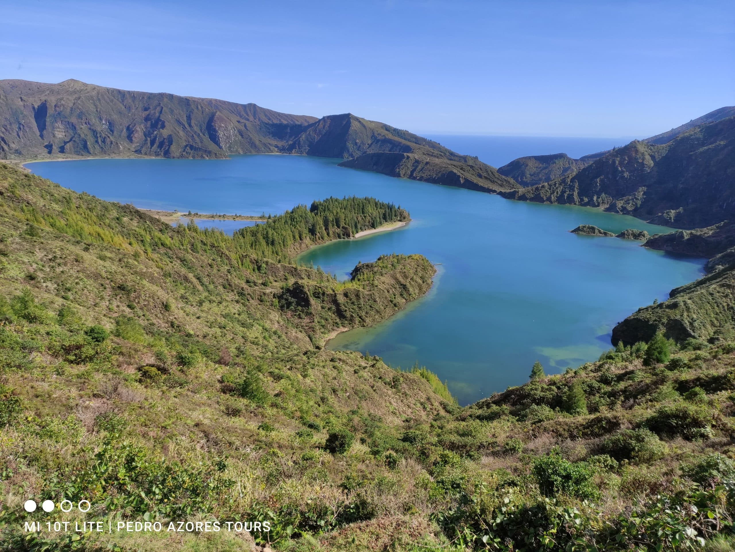 Panoramic crater lake vista in Azores for scenic hiking