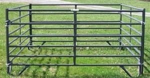 Portable livestock corral panels on grass for rodeo or ranch events