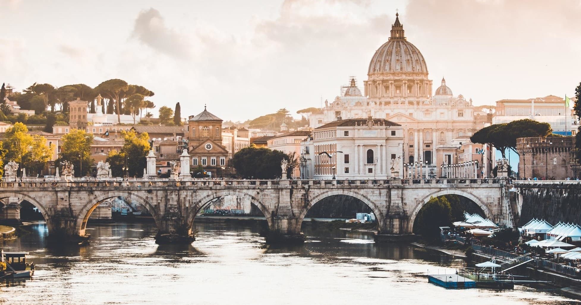 Panoramic Tiber River sunset with St. Peter's skyline, Rome