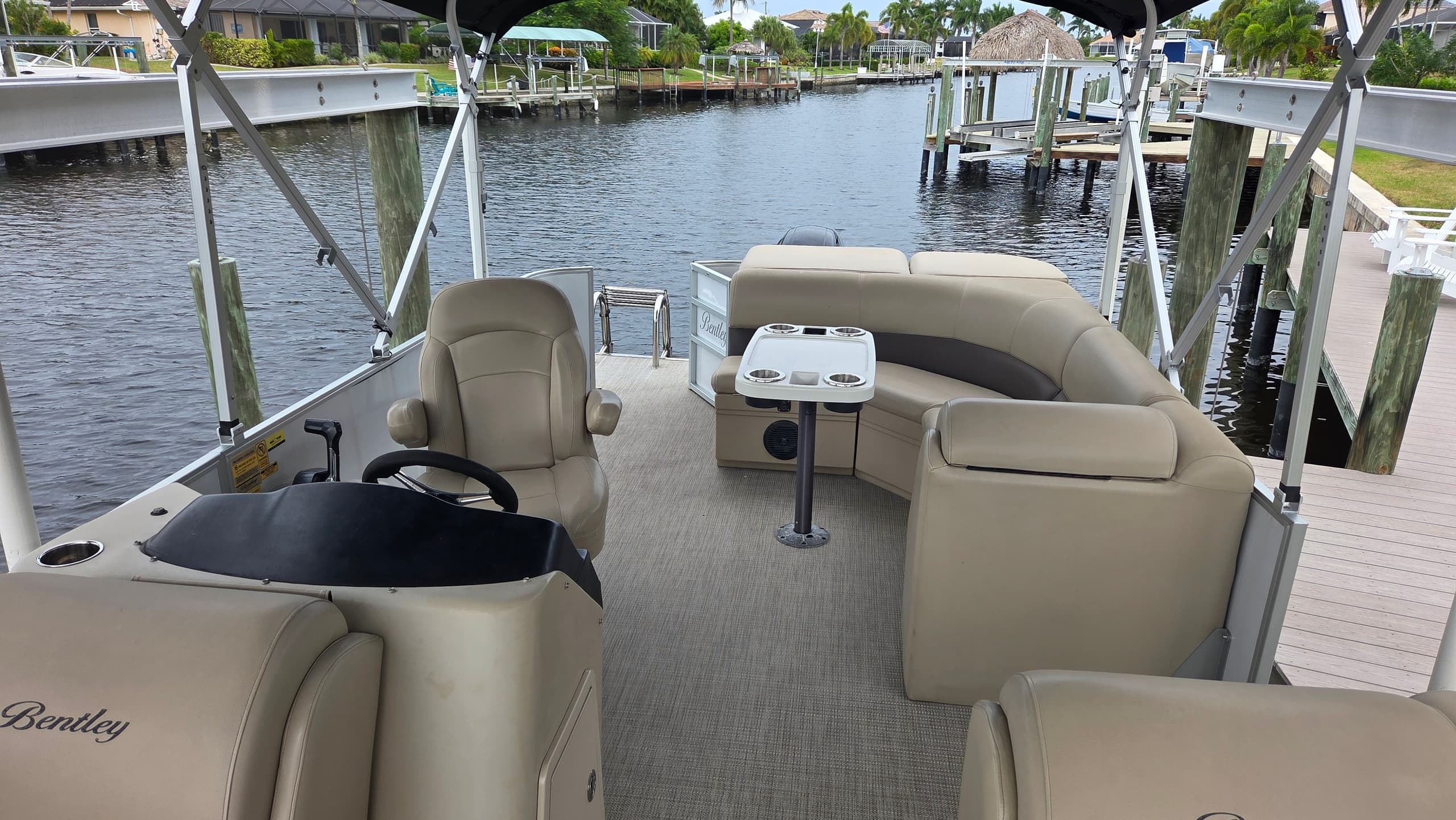 Cruise Cape Coral: Bentley Pontoon 200hp Elite Day Charter photo 1