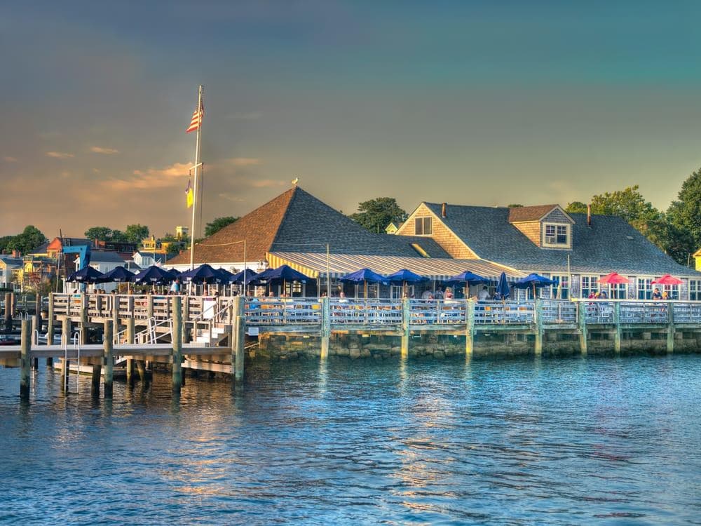 Vibrant waterfront pier and dockside restaurant with boats moored