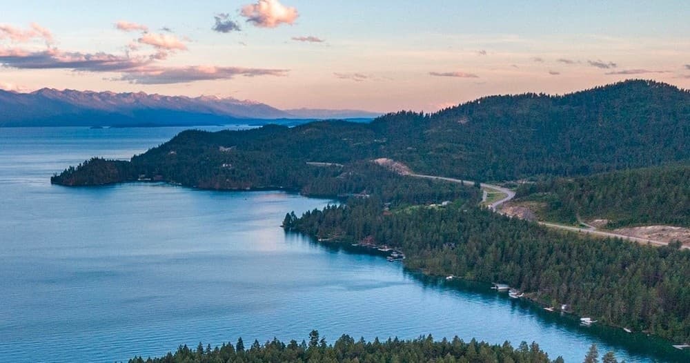 Aerial coastal lake view with islands and forested shoreline