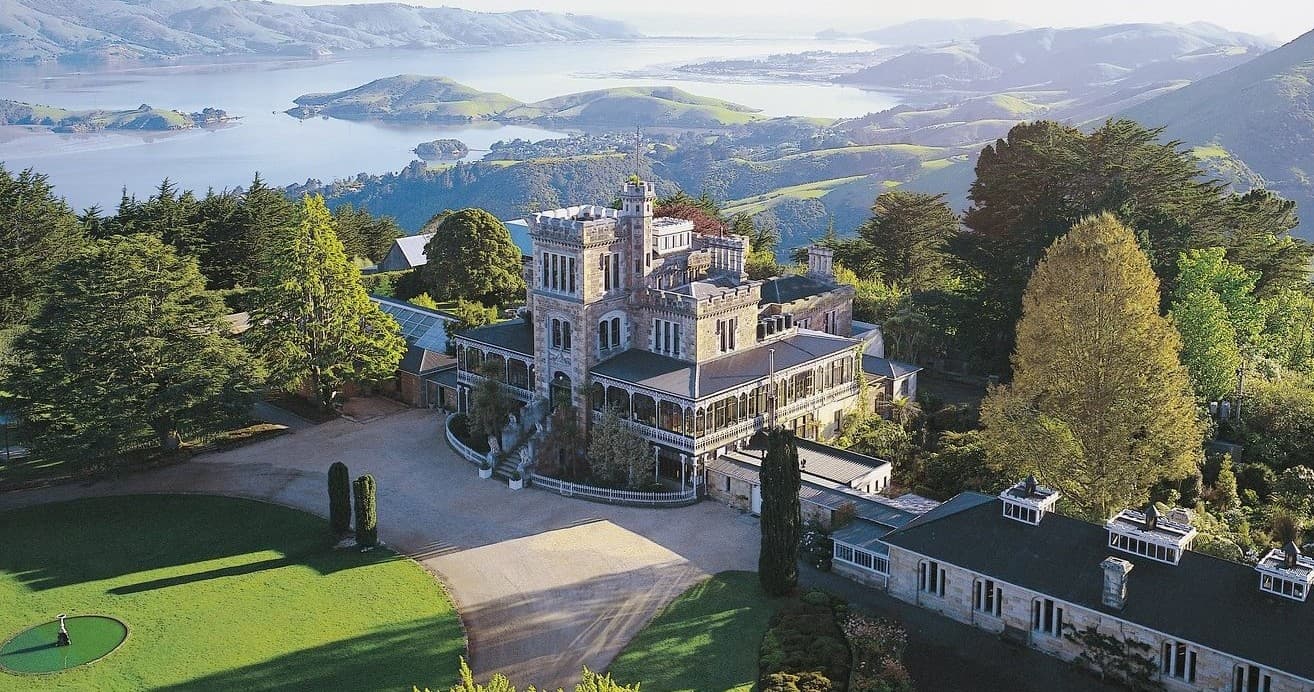 Aerial view showcasing Larnach Castle and Otago Peninsula grounds