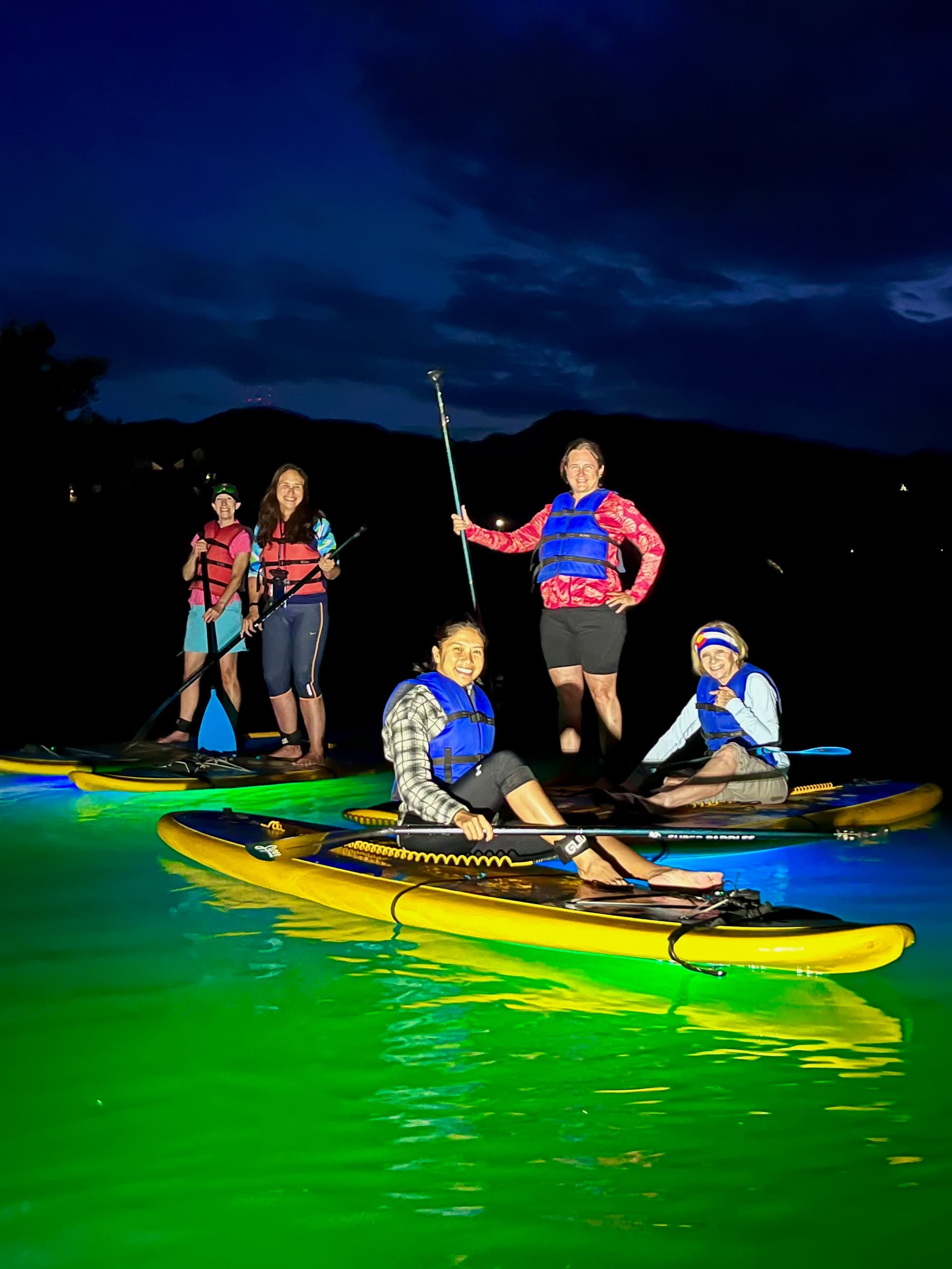 Glow SUP Night Paddleboarding with Dragonfly Paddle Yoga