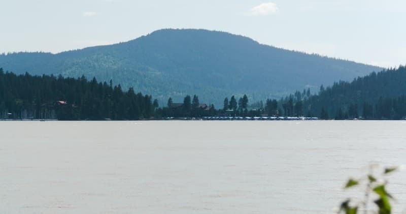 Mountain backdrop across wide lake for scenic boating