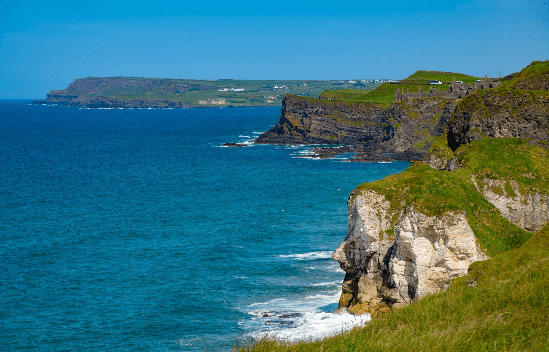 Rocky Irish coastline with cliffs and turquoise Atlantic waters