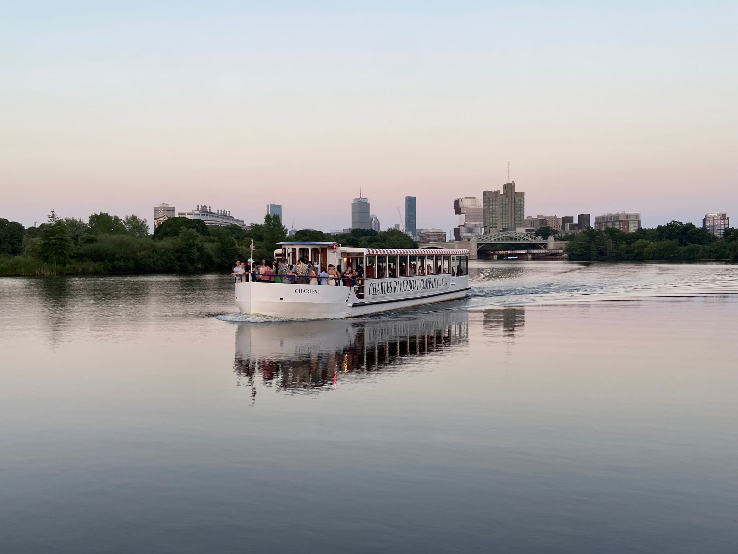 Scenic Charles River cruise boat gliding on calm water
