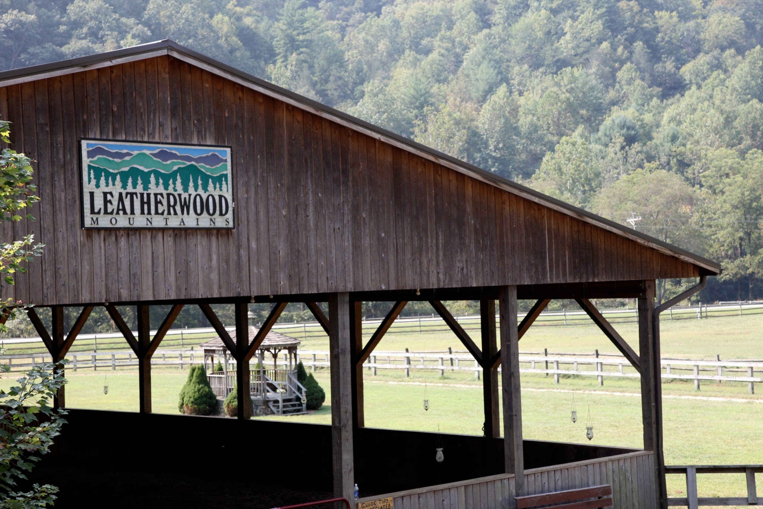 Covered riding arena and barn at Leatherwood mountain camp