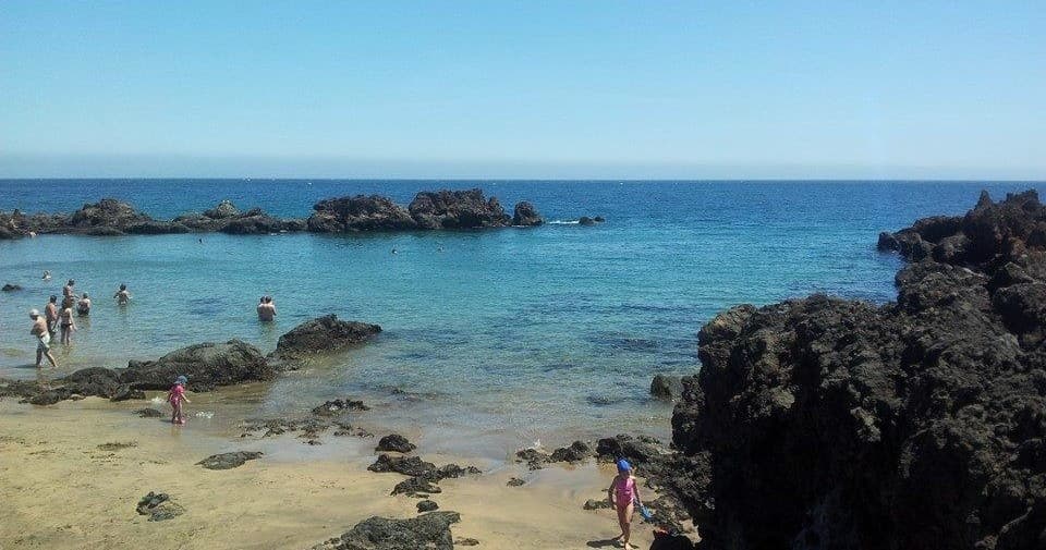 Rocky Lanzarote beach panorama showing shore and dive entry