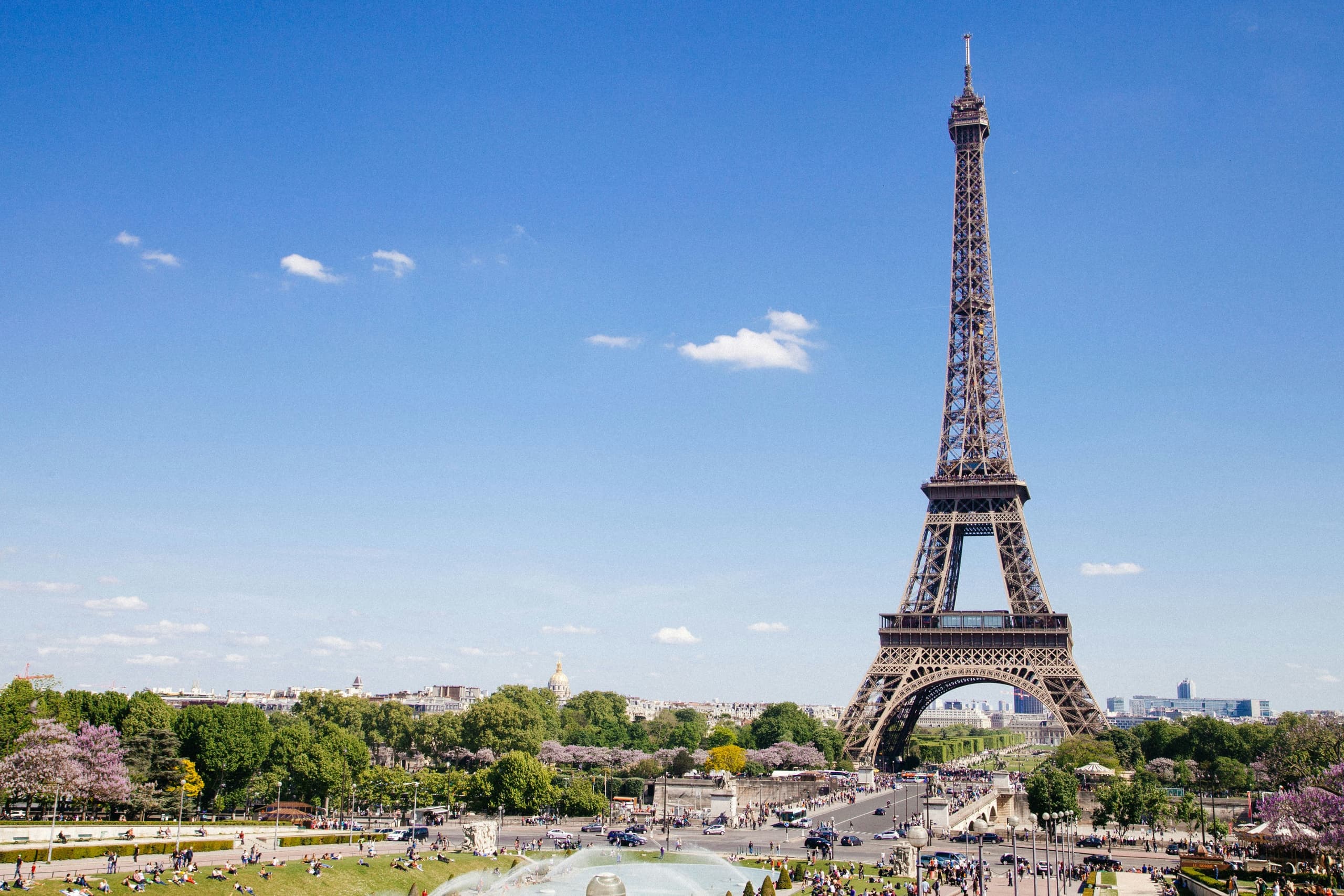 Panoramic view of iconic Eiffel Tower from riverside park walk