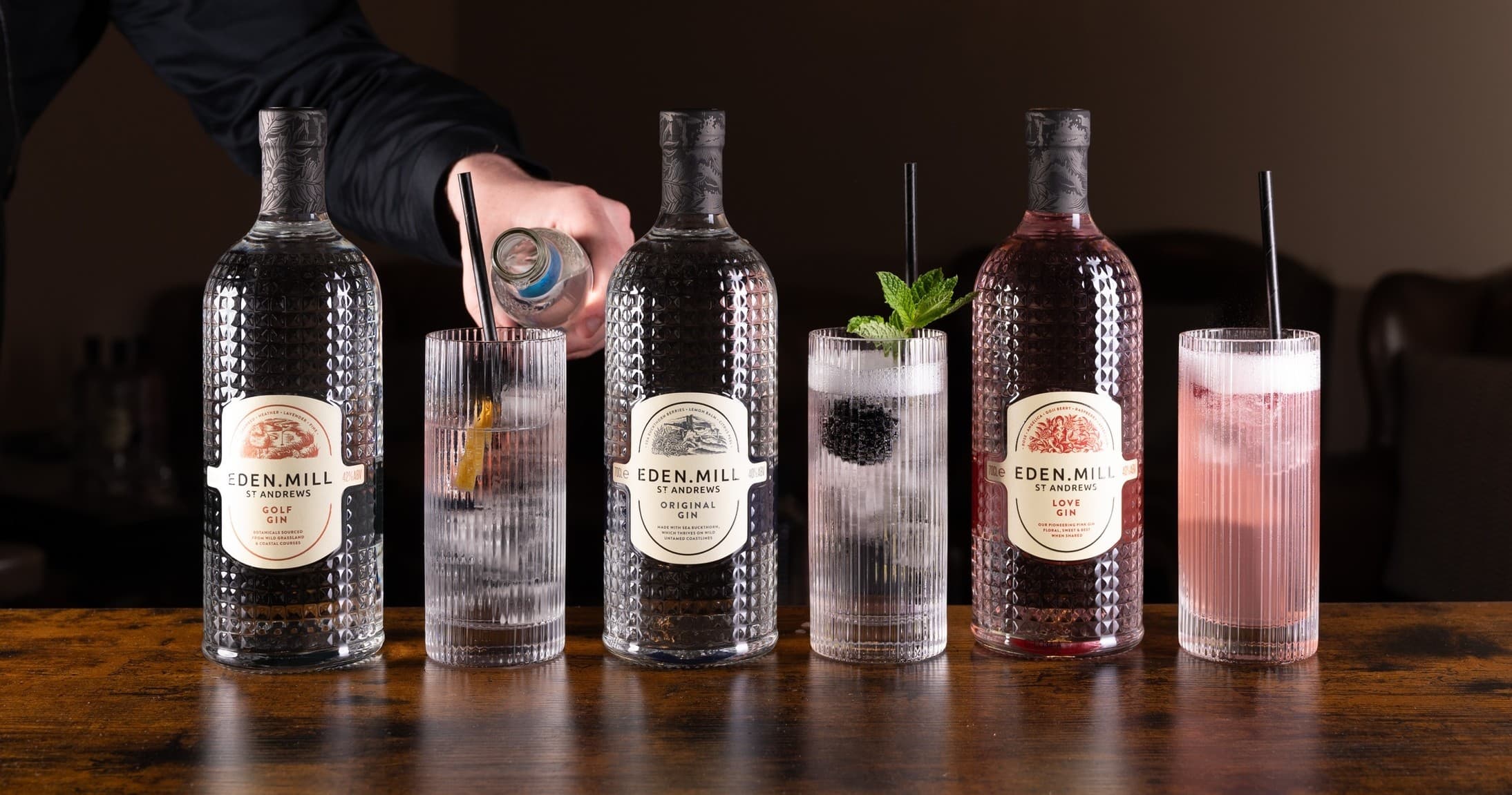 Bottles and cocktails displayed on bar at Eden Mill tasting session