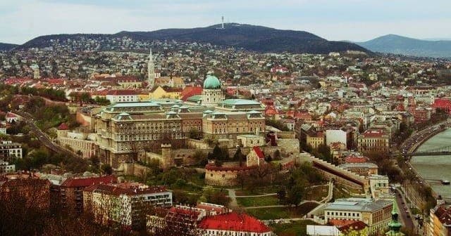 Panoramic aerial view of Budapest cityscape with Buda Castle skyline