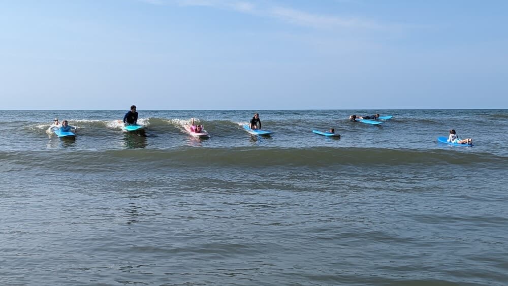 Private Group Surf Experience on Charleston Beaches: Custom Lessons for Families & Teams