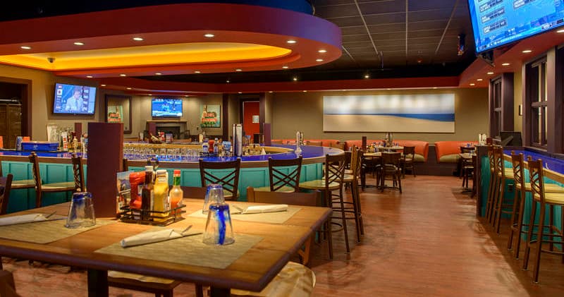 Interior view of bowling alley bar and lounge with lanes