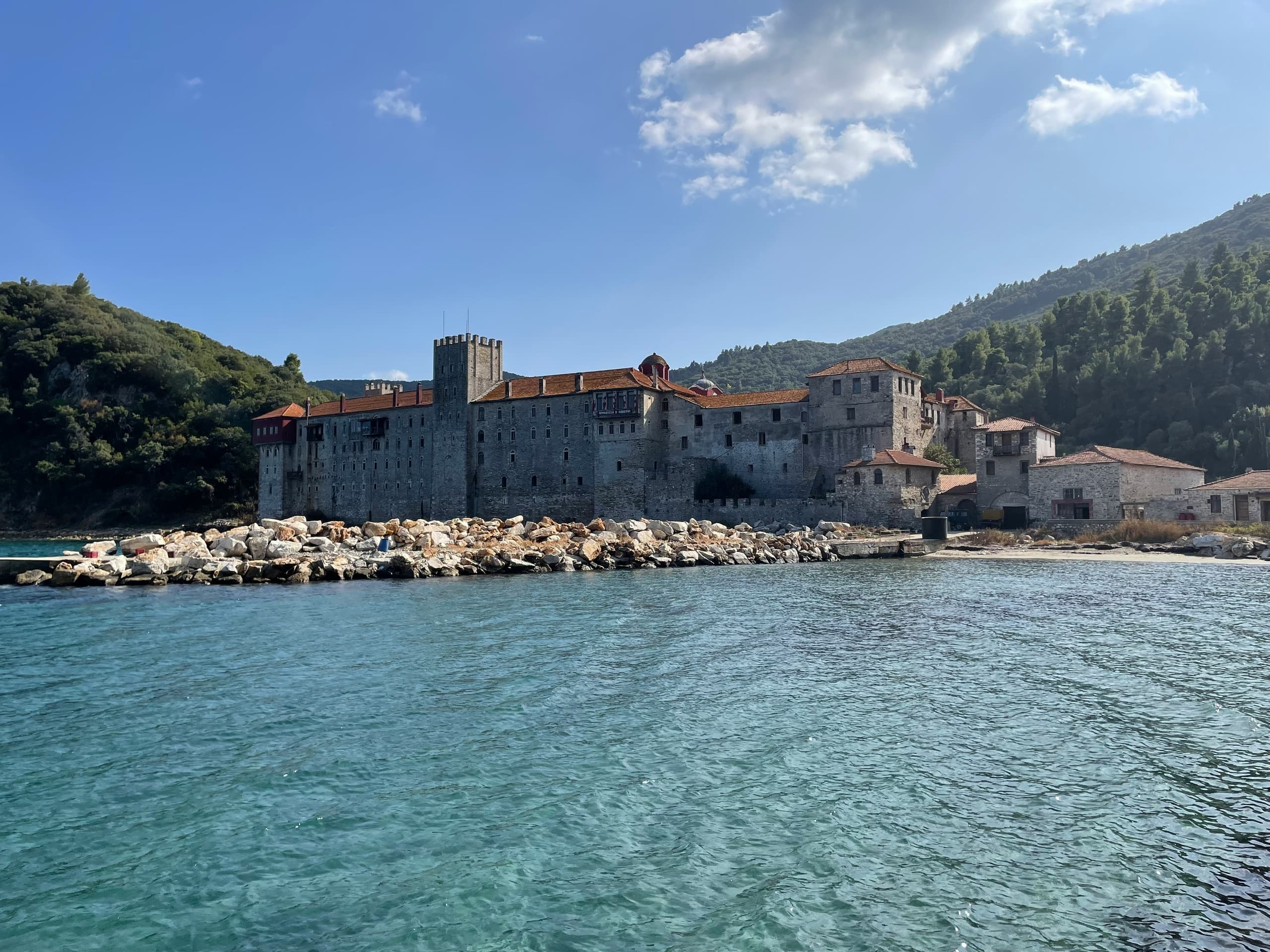 Historic seaside fortress by turquoise water, coastal sightseeing