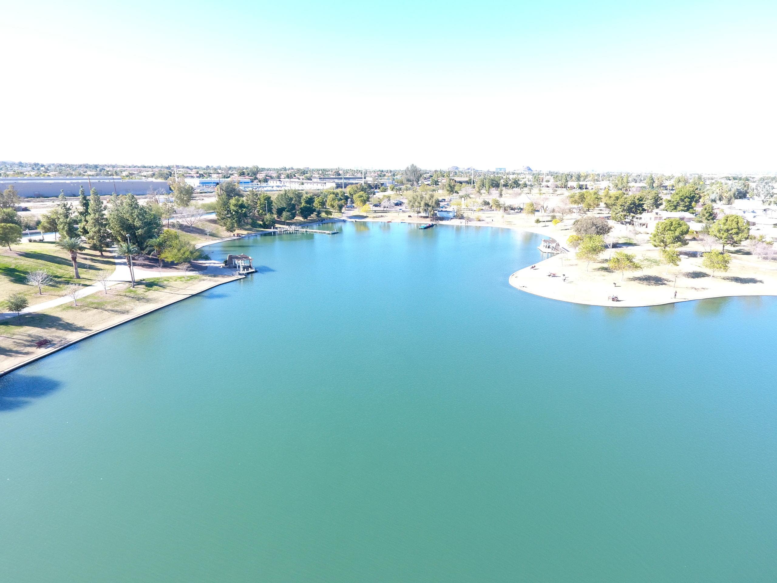 Aerial view of Kiwanis Lake shoreline and turquoise water