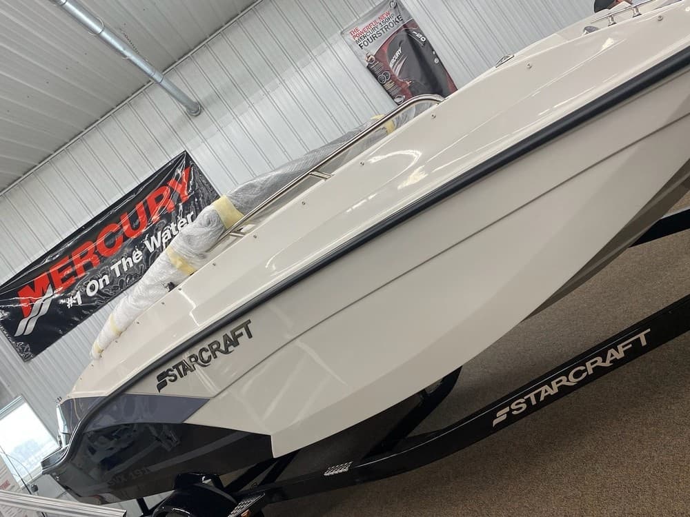 Relax and Play on Leech Lake with Starcraft 2000 Deck Boat